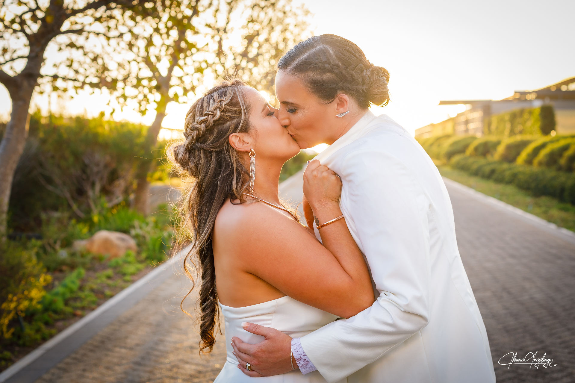 Golden hour couple kiss