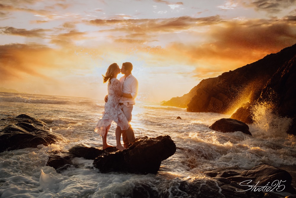 Couple on beach at sunset